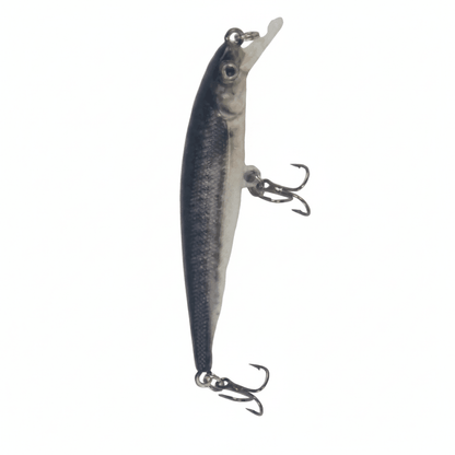 Diving fishing lure with dark blue back, silver belly, and two treble hooks