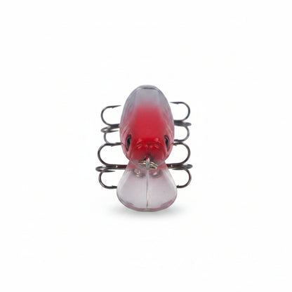 Hard body swimbait lure, red top and clear body with two treble hooks