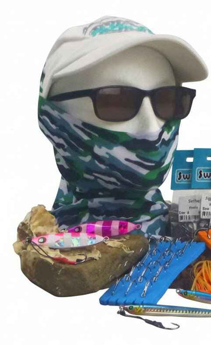 Fishing jig gift pack with camo face covering, blue lure, and assorted metal jigs