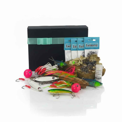Jigging tackle gift set with assorted lures and hooks in a storage box