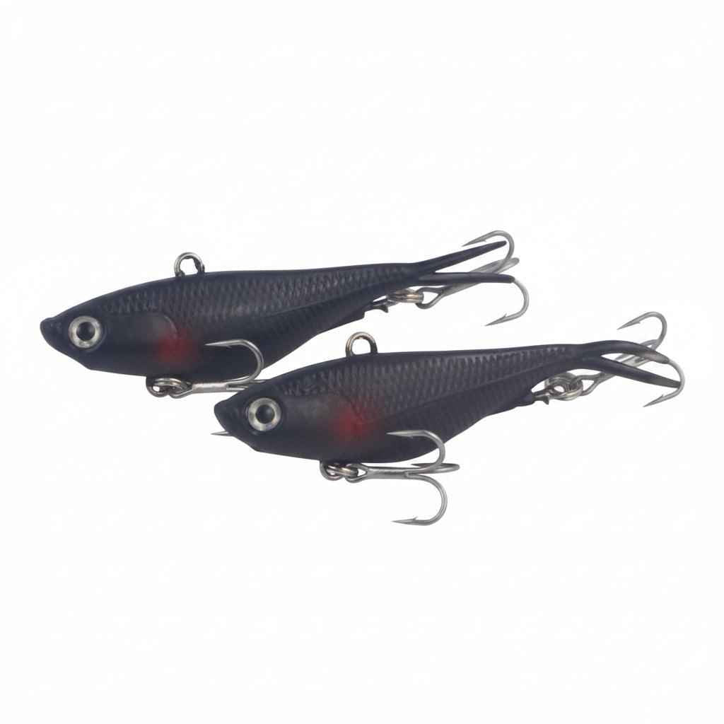 Pair of 95mm soft vibe lures, dark carbon with red spots, fork tail, treble hooks