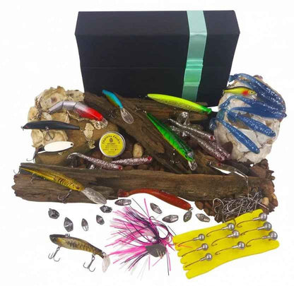 Fishing lure gift pack with assorted hard and soft lures, hooks, and a gift box